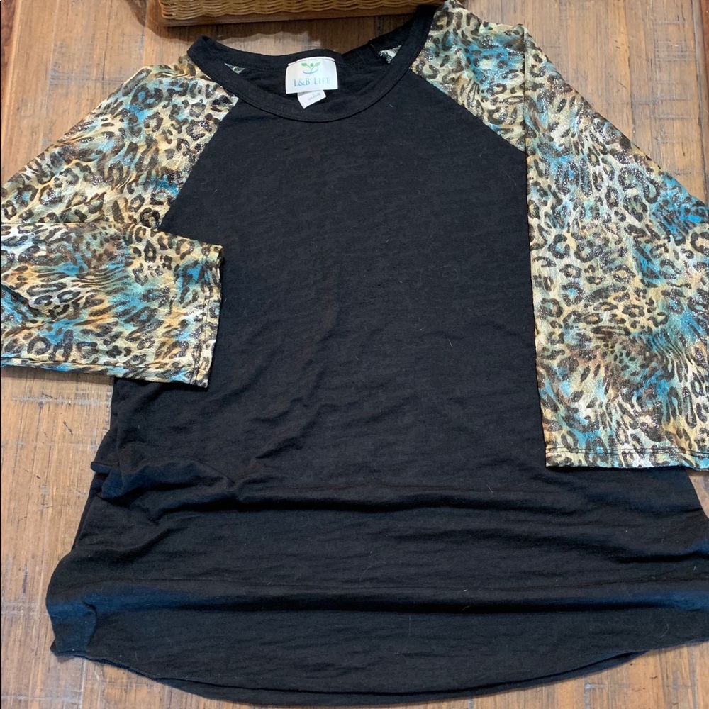 Women’s burn out style shirt with animal print